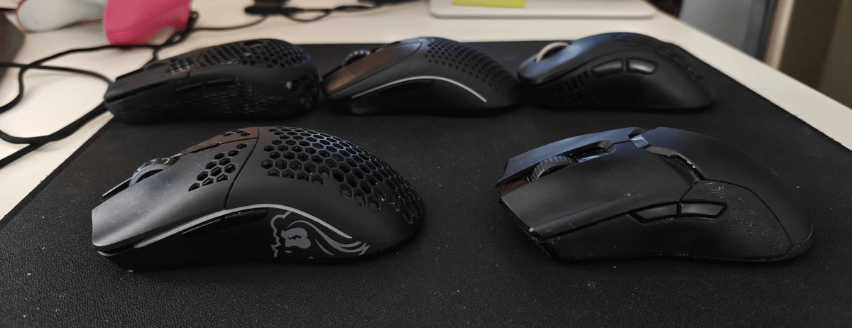 A photo of some mice lined up on a mouse pad